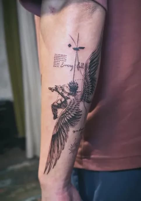 Tattoo artist preparing a detailed piece in studio lighting